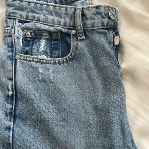 Medium Wash Straight-Legged Jeans with Raw Hem and Button Fly